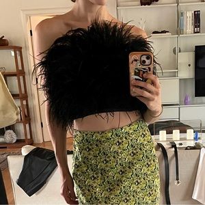 Black feather crop top.